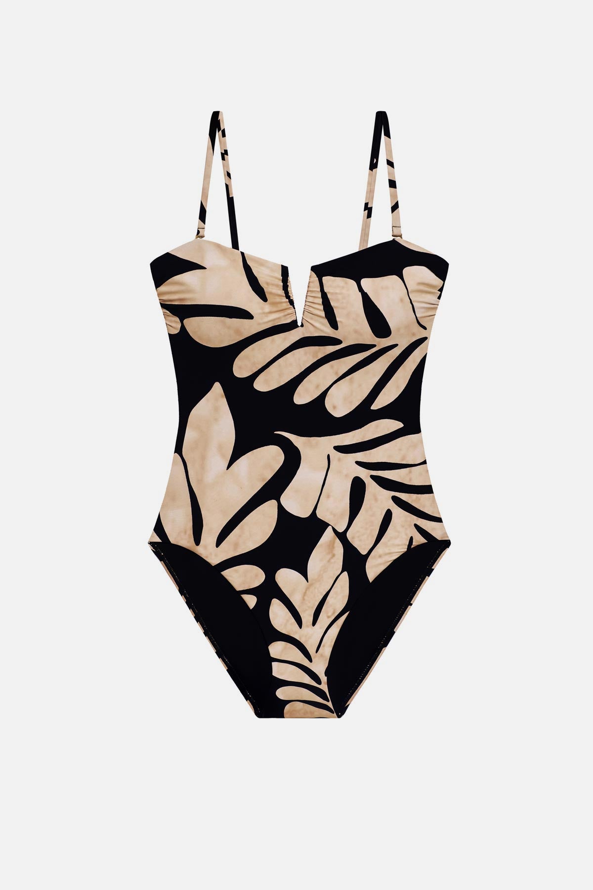 One-piece swimsuit with a black and tan palm leaf print