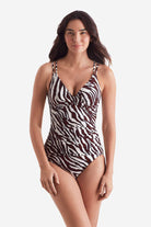 Woman wearing a zebra print tankini top